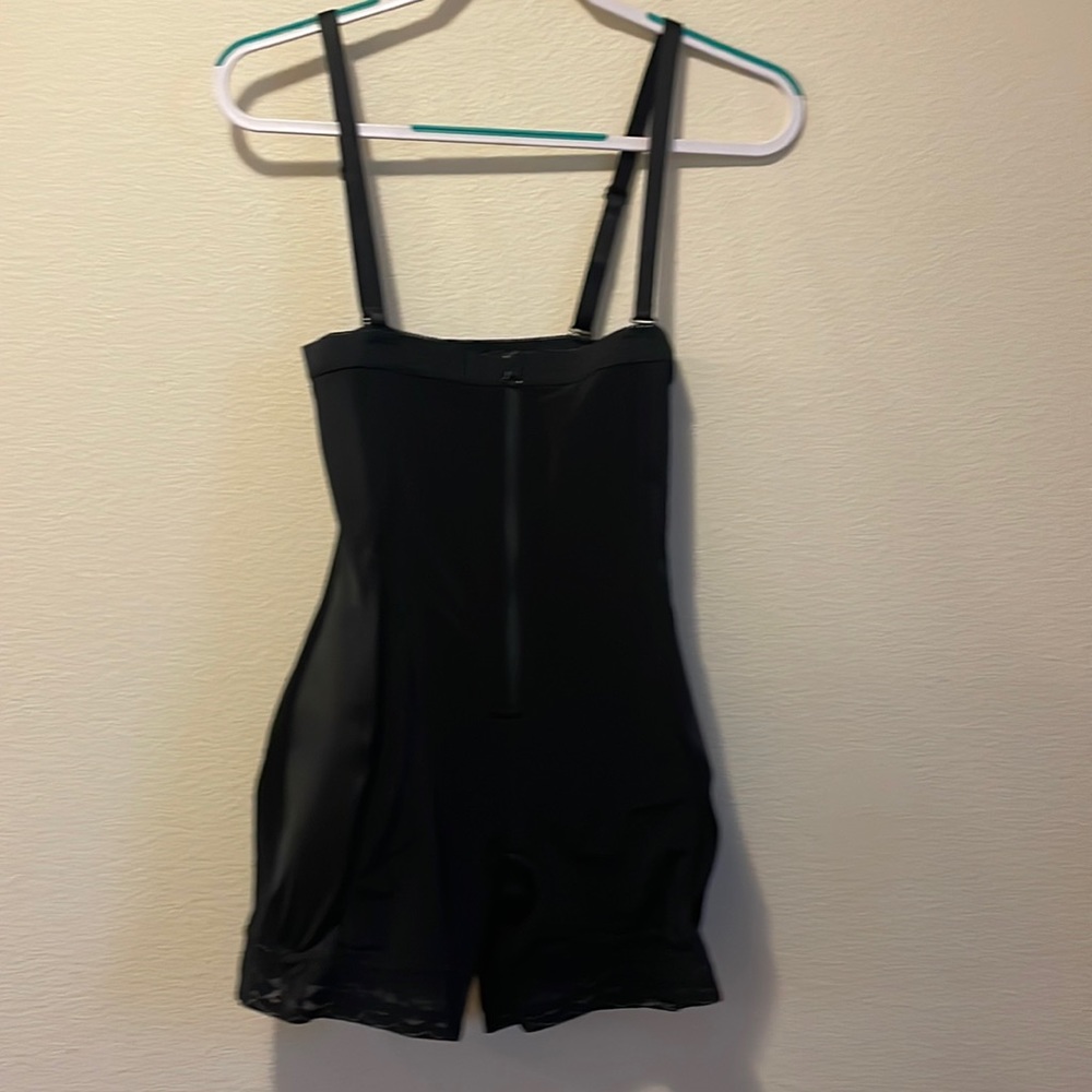 Never worn body shaper color, black size medium.